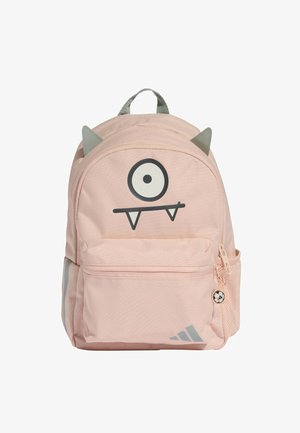 Mochila rosa para niños con un ojo grande, dos orejas grises y dos formas de dientes en el bolsillo frontal con cremallera y bolsillo lateral de malla.