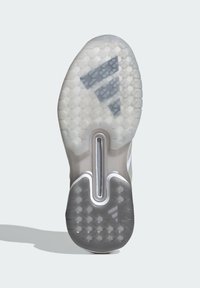 Podrážka obuvi s šedo-bielou farebnou schémou, hexagonálnymi vzormi, centrálnym drážkou a viditeľným logom na oblasti päty.