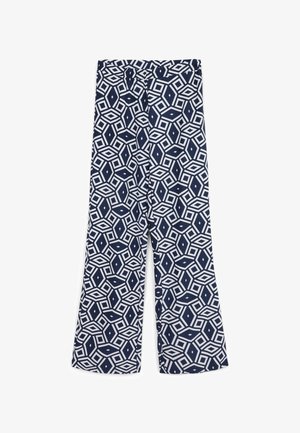 Pantalons larges à motifs navy avec un design géométrique blanc. Confectionnés en tissu léger avec une taille élastique pour plus de confort.