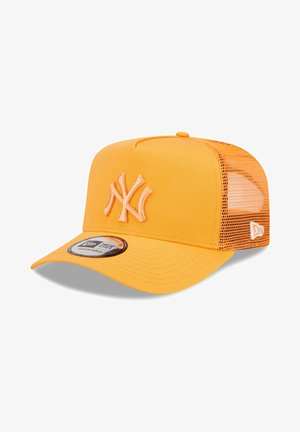 Orange cap with mesh back, featuring embroidered New York Yankees logo. Curved brim and adjustable snapback closure.