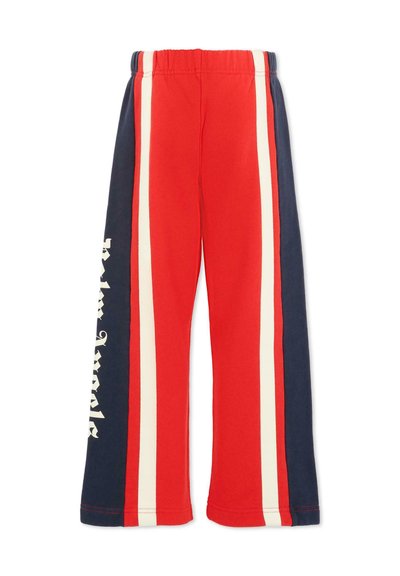 Rode en marineblauwe sweatpants met witte zijstrepen en een elastische tailleband, voorzien van een grafische tekstdetail op één been. Zacht, ontspannen ontwerp.