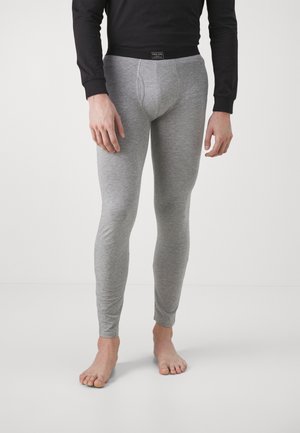 Grå leggings tillverkade av mjukt tyg, med en åtsittande design, elastisk midja och avsmalnande benöppningar, kompletterade med en subtil lyster.