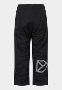 Mustat vedenpitävät housut, joissa on joustava vyötärö, heijastava logotaito ja säädettävät tarranauhakahvat. Sujuva kangas, jossa on kiiltävä pinta.