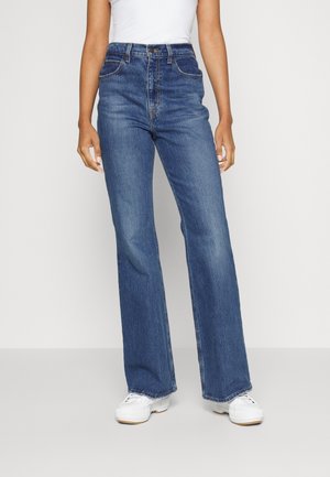 Vaqueros a campana - stone blue denim