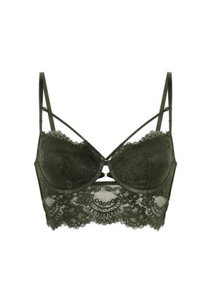 Dark green lace bra with padded cups, decorative lace trim, and crisscross straps. Features floral patterns and a center keyhole detail.