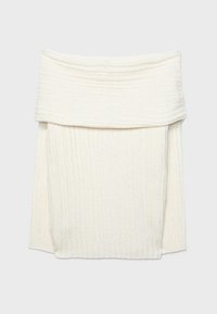 Rebrasta, kremasto obarvana pletena krilca v obliki cevi z širokim, zloženim pasom. Ima mehko teksturo in elegantno, oprijeto obliko.