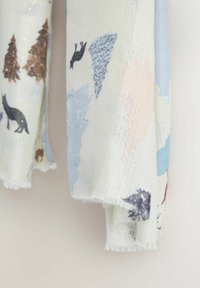 Lightweight, textured scarf in pastel colors featuring animal and tree patterns, with subtle glitter accents and fringed edges.