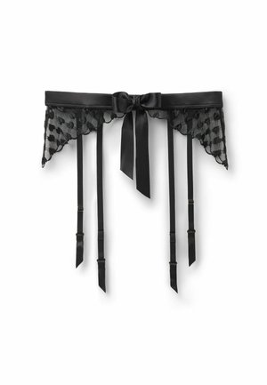 Reggicalze in pizzo nero con sei cinturini regolabili e un fiocco di raso annodato al centro.