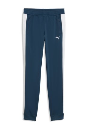 Marineblå, atletiske joggers med hvide side-striber, lynlåslommer, ribbede manchetter og et hvidt Puma-logo på venstre lår.