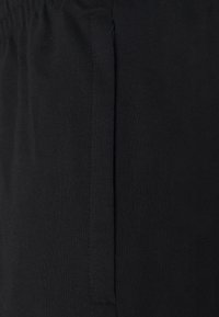 Hummel PANT - Trainingsbroek - black