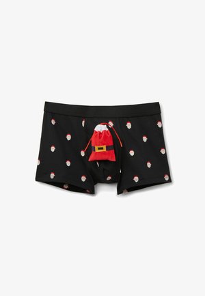 Zwarte boxershorts met een herhaald patroon van het gezicht van de kerstman. Voorzien van een zachte rood-witte kerstmanzak als detail aan de voorkant.
