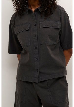 Dark gray, short-sleeved shirt with two chest pockets, button front, and a relaxed fit made from textured cotton fabric.