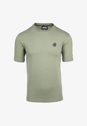 Oliivroheline lühikeste varrukatega T-särk, mis on valmistatud pehmest puuvillast, vasakul rinnal on tumehall alatooniga ahvi logo. Ümmargune kaelus.