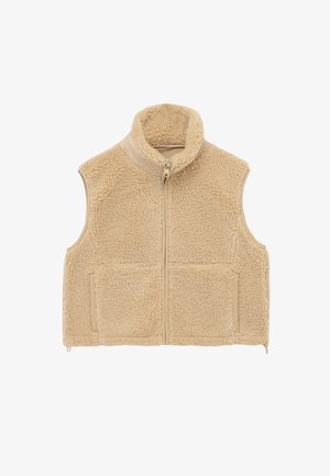 Beige sherpa fleece liivi, jossa on korkea kaulus, täysipitkä vetoketju ja sivutaskut, suunniteltu lämpöä ja rentoa käyttöä varten.