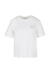 T-shirt bianco in cotone con collo giro e maniche corte. Presenta il testo "NON GUARDARE MAI INDIETRO" in grigio sulla parte anteriore. Texture liscia.