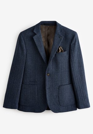 Blazer a spina di pesce blu navy realizzato in lana testurizzata, con un solo bottone, due tasche frontali e una fodera marrone a fantasia.