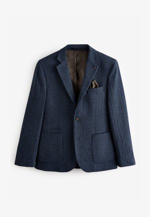 Navy blue herringbone blazer made from textured wool, featuring a single button, two front pockets, and a patterned brown lining.
