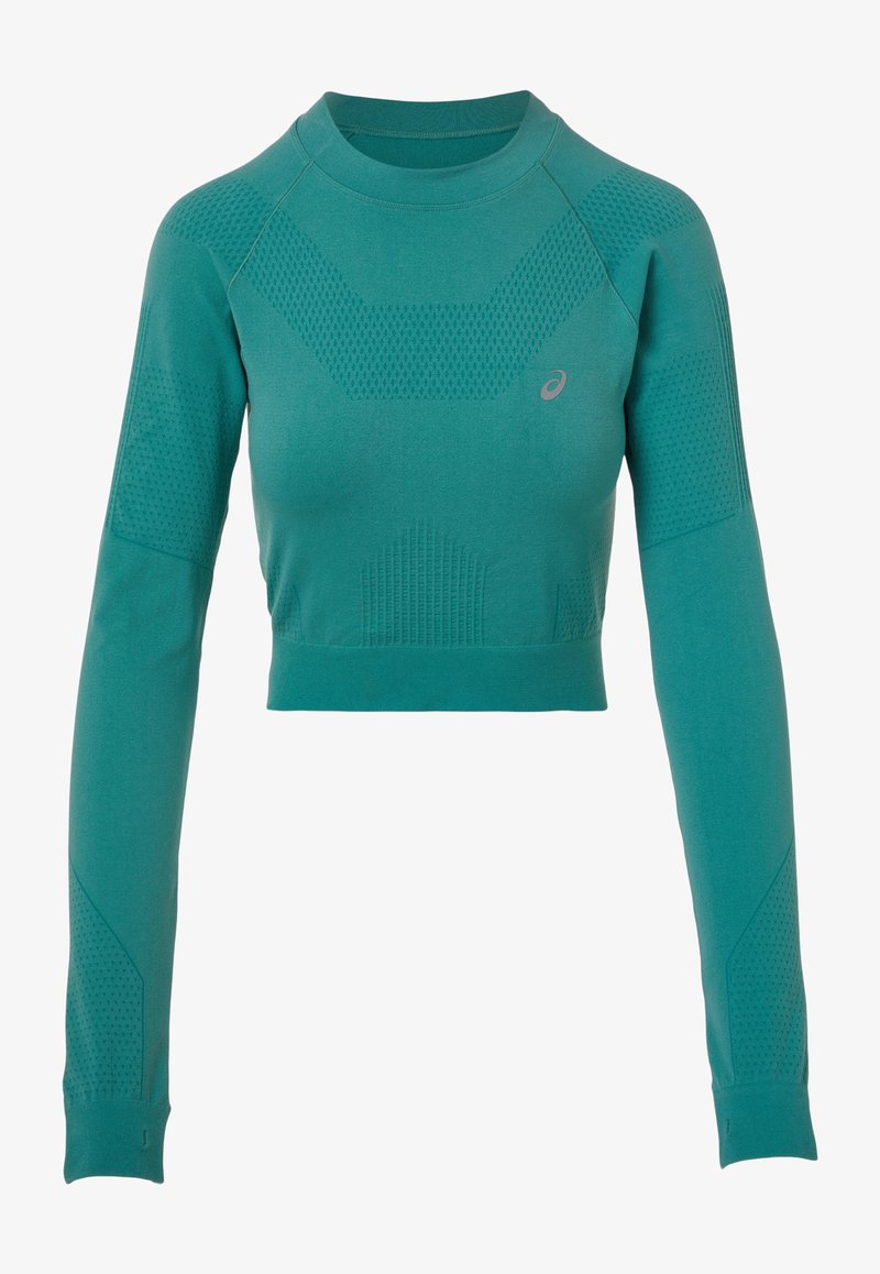 Maglietta a maniche lunghe tagliata in teal, con motivi testurizzati, scollo a girocollo e un design aderente. Include un piccolo logo sulla parte anteriore.
