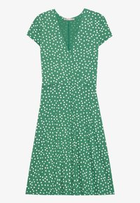 Grön klänning med prickar, korta ärmar, V-urringning, åtsittande midja och veckad kjol. Materialet verkar lätt, med vita cirkulära mönster.