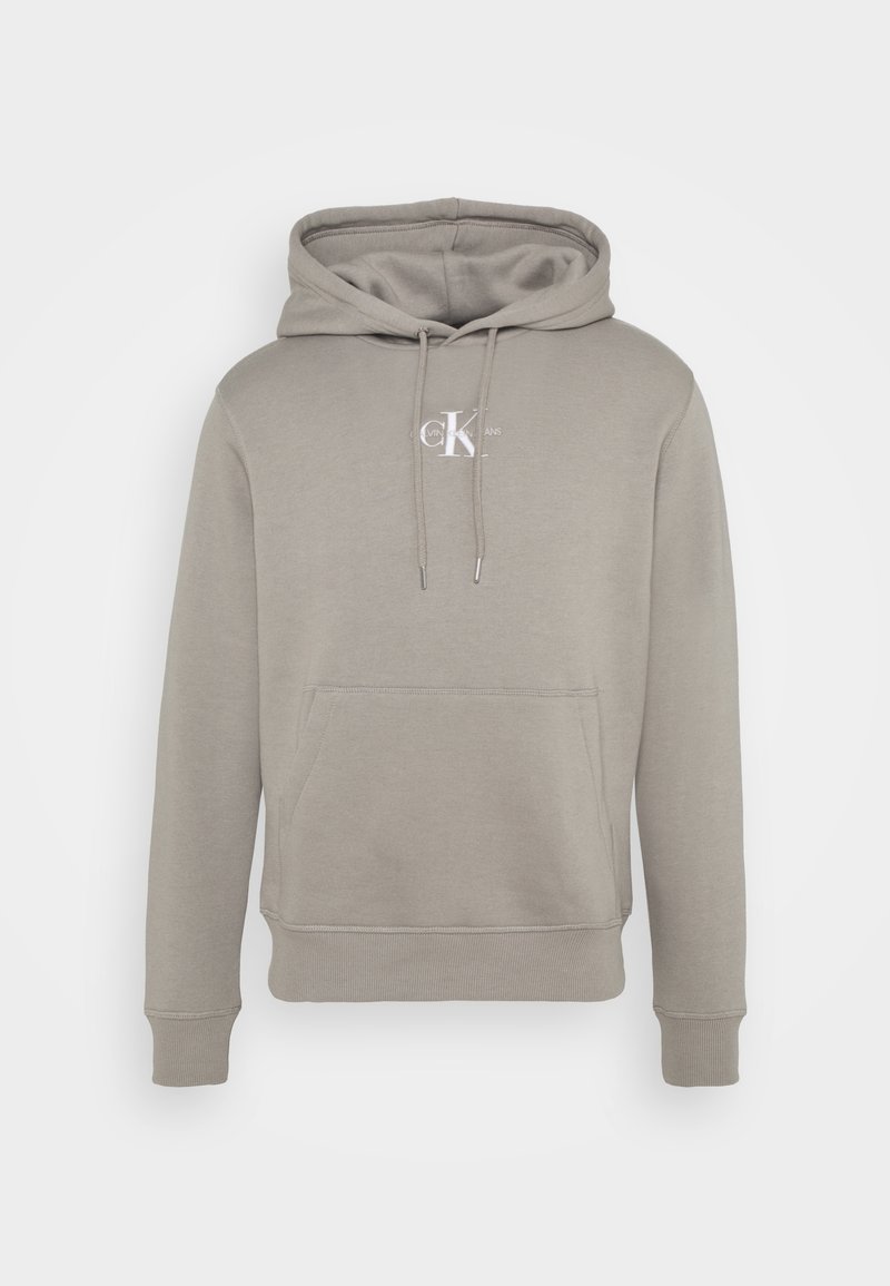 Sweat à capuche gris clair avec poche kangourou devant, capuche avec cordon, poignets et bas côtelés, avec petit logo blanc Calvin Klein sur la poitrine.
