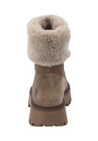 Stivaletto alla caviglia in camoscio beige con polsino in pelliccia sintetica e suola robusta in gomma rigata. Presenta un logo semplice impresso sul lato.