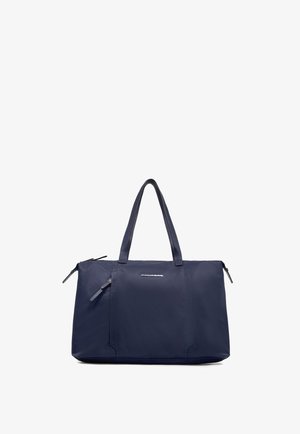Bolsa tote rectangular azul marino con dos asas y bolsillo delantero con cremallera, con logotipo pequeño en plata.
