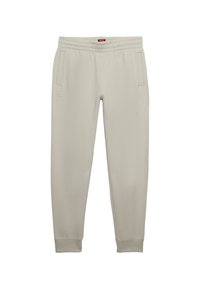 Hellgraue Jogginghosen aus weichem Stoff, mit elastischem Bund, zwei Seitentaschen und gerippten Bündchen an den Knöcheln.