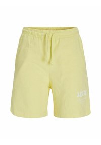 Shorts de algodón amarillo claro con cinturilla elástica, cordón ajustable y detalle de logo impreso en blanco en la pierna izquierda.