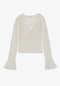 Weißes Spitzentop mit langen Glockenärmeln, V-Ausschnitt und Knopfdetails an der Vorderseite. Sanfte Textur, schlanker Schnitt und zartes Muster.