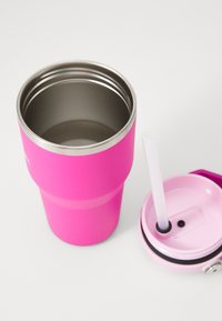 Tall, insulated drink tumbler with a bright pink exterior, silver stainless steel interior, and a lid featuring a white straw and black nozzle.
