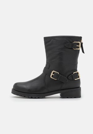 Botines camperos - black