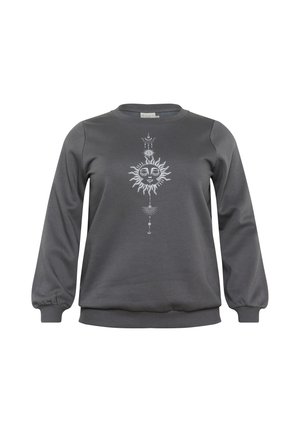 Sudadera gris hecha de un tejido suave, con un diseño gráfico blanco de un sol y elementos decorativos en el centro y la parte superior.