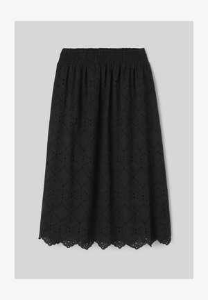 Jupe noire longueur genou avec taille élastique, broderie ajourée florale et géométrique et ourlet festonné.