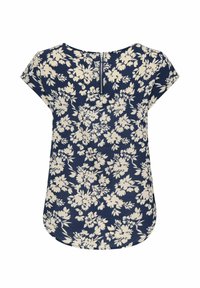 Blouse bleu marine avec imprimé floral blanc, manches courtes, ourlet arrondi et fermeture éclair dans le dos.