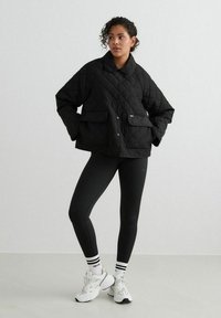 aim’n® QUILTED FEMME - Light jacket - black