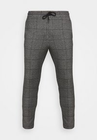 Szare spodnie w kratę z elastycznym pasem i regulowanym sznurkiem. Charakteryzują się zwężanym krojem i subtelną fakturą tkaniny.