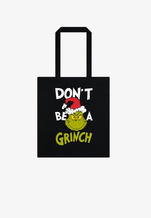Czarna torba typu tote z postacią zielonego Grincha w czerwonej czapce Mikołaja. Napis "NIE BĄDŹ GRINCHEM" w białych i zielonych literach.