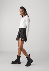 Puma Áčková sukně - black