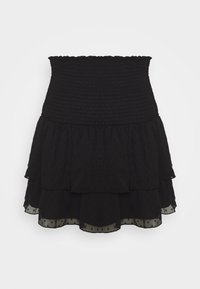 Falda mini negra de capas con cintura fruncida y un sutil patrón de puntos texturizados, que presenta un dobladillo fluido de doble nivel.