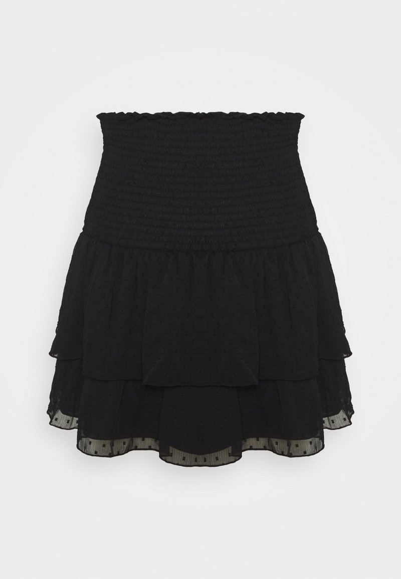 Falda mini negra de capas con cintura fruncida y un sutil patrón de puntos texturizados, que presenta un dobladillo fluido de doble nivel.