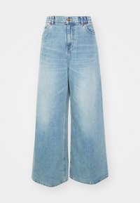 Jeans wide-leg blu chiaro in denim, con vita alta, chiusura con bottone e tasche frontali. Lavaggio sbiadito con orlo leggermente sfrangiato.