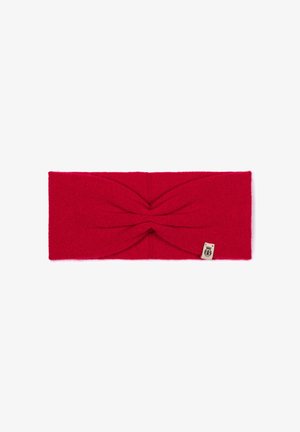 Red knitted headband with a twist design at the front. Soft texture, elastic material, and a small label attached on the side.