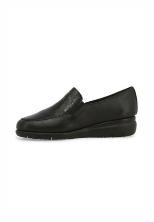 Scarpa nera in pelle con finitura liscia, punta arrotondata, tacco a zeppa basso e dettagli di cucitura discreti lungo le cuciture.