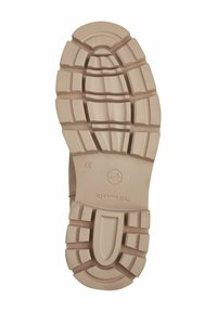 Tan rubber outsole with a textured grip pattern featuring deep treads and contoured design. Marked with "Clarks" and size "37."