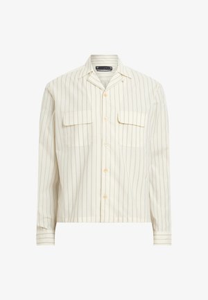 Chemise crème claire à fines rayures verticales, avec un devant à boutons, deux poches poitrine et un col classique. Tissu lisse avec des manches longues.