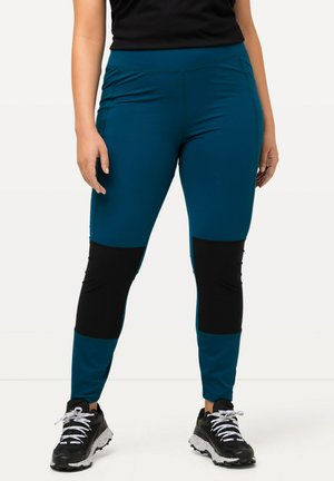Teal en zwarte sportleggings met een strakke pasvorm, voorzien van kleurblokken bij de knieën en een soepele textuur voor comfort.