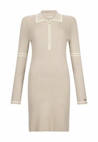 Abito beige a coste con colletto con zip, maniche lunghe e strisce bianche a contrasto. Presenta una siluette aderente e un dettaglio con logo vicino all'orlo.