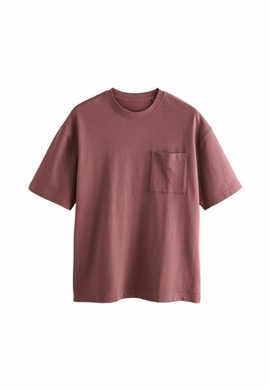 Maglietta a maniche corte, con collo rotondo, in rosa polveroso. Realizzata in cotone, presenta una tasca sul petto sinistro. Tessuto morbido e liscio con una vestibilità comoda.