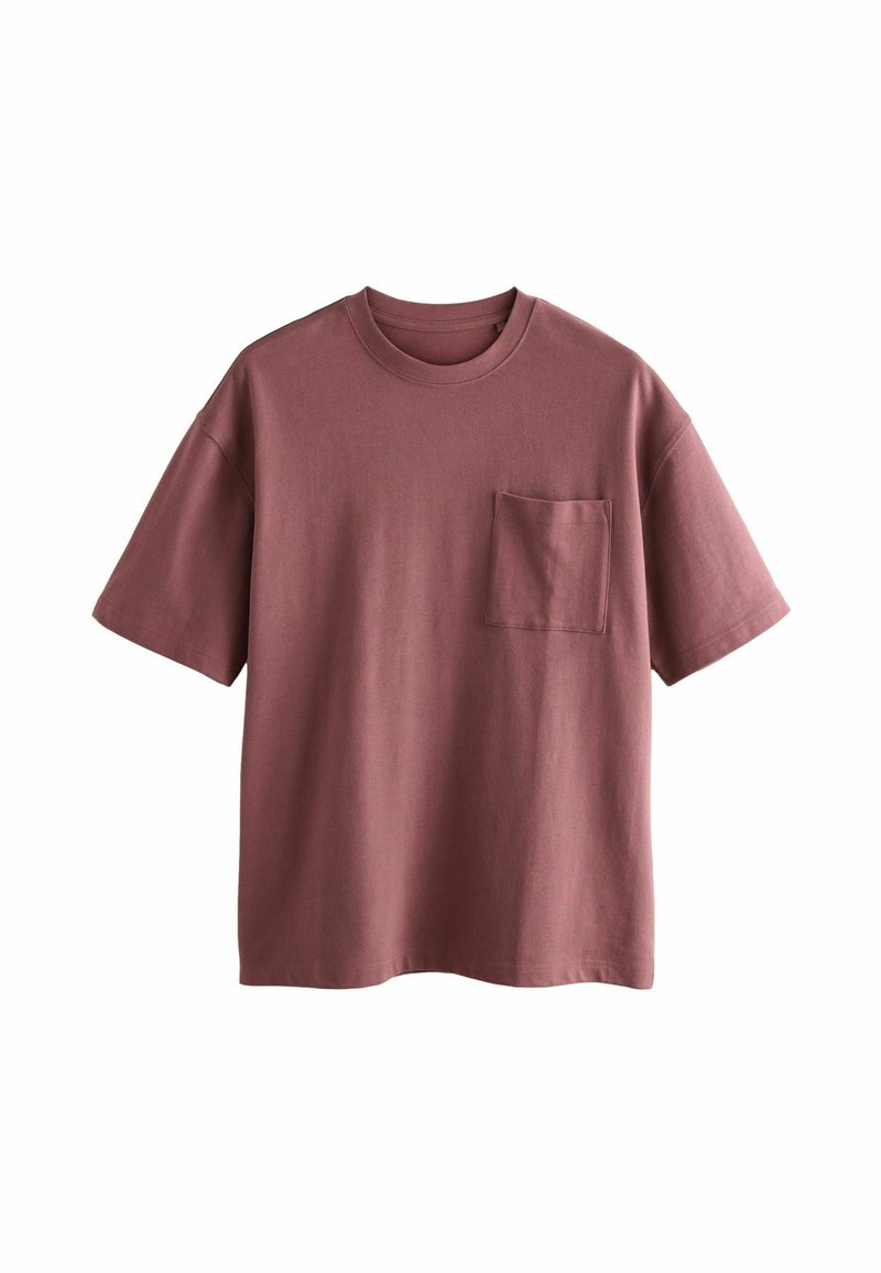 Kortærmet t-shirt med runde hals i støvet rosa. Lavet af bomuld, med en lomme på venstre bryst. Blød, glat tekstur med en afslappet pasform.