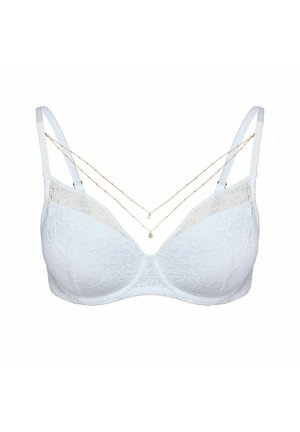White lace bra with padded cups, adjustable straps, and a lace overlay. Features two delicate gold chains draped across the front.
